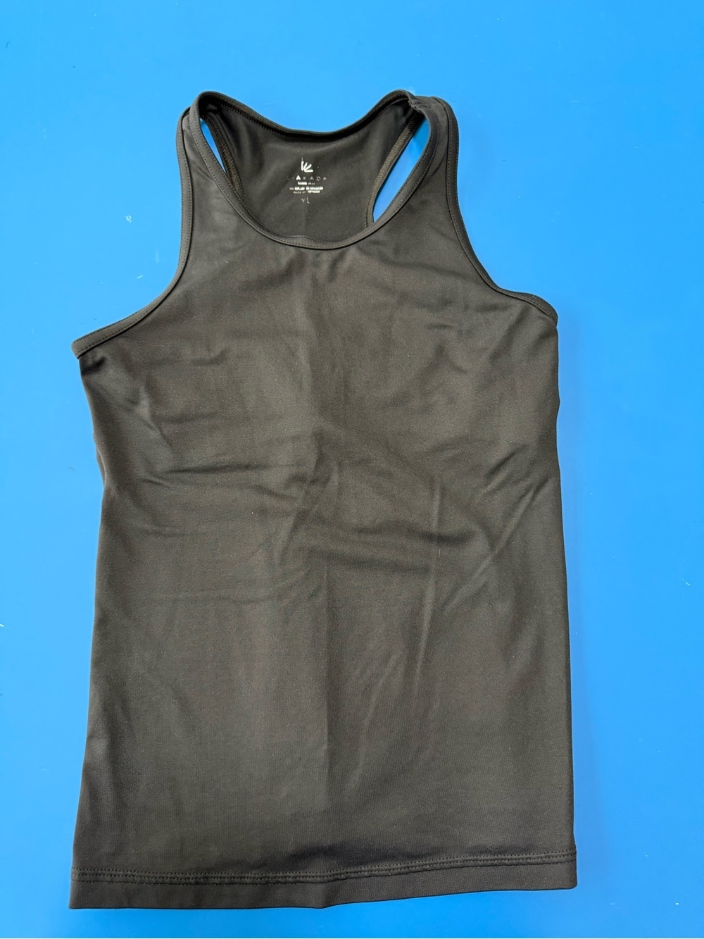 Liakada Girls Racerback Tank Top. Size 12. Excellent Condition.